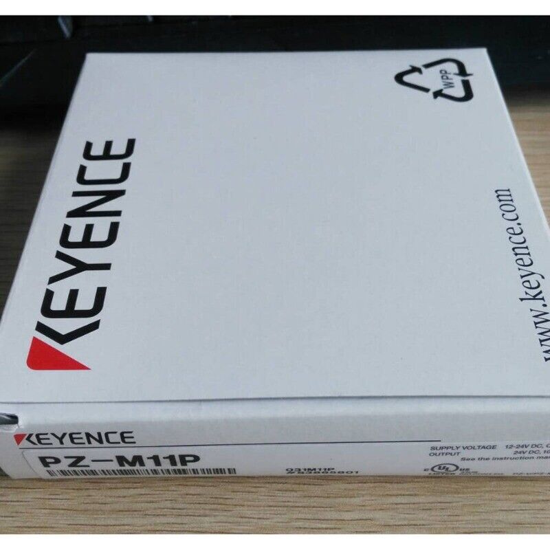 Keyence PZ-M11P photoelectric sensor box, white packaging with product details, www.keyence.com printed.
