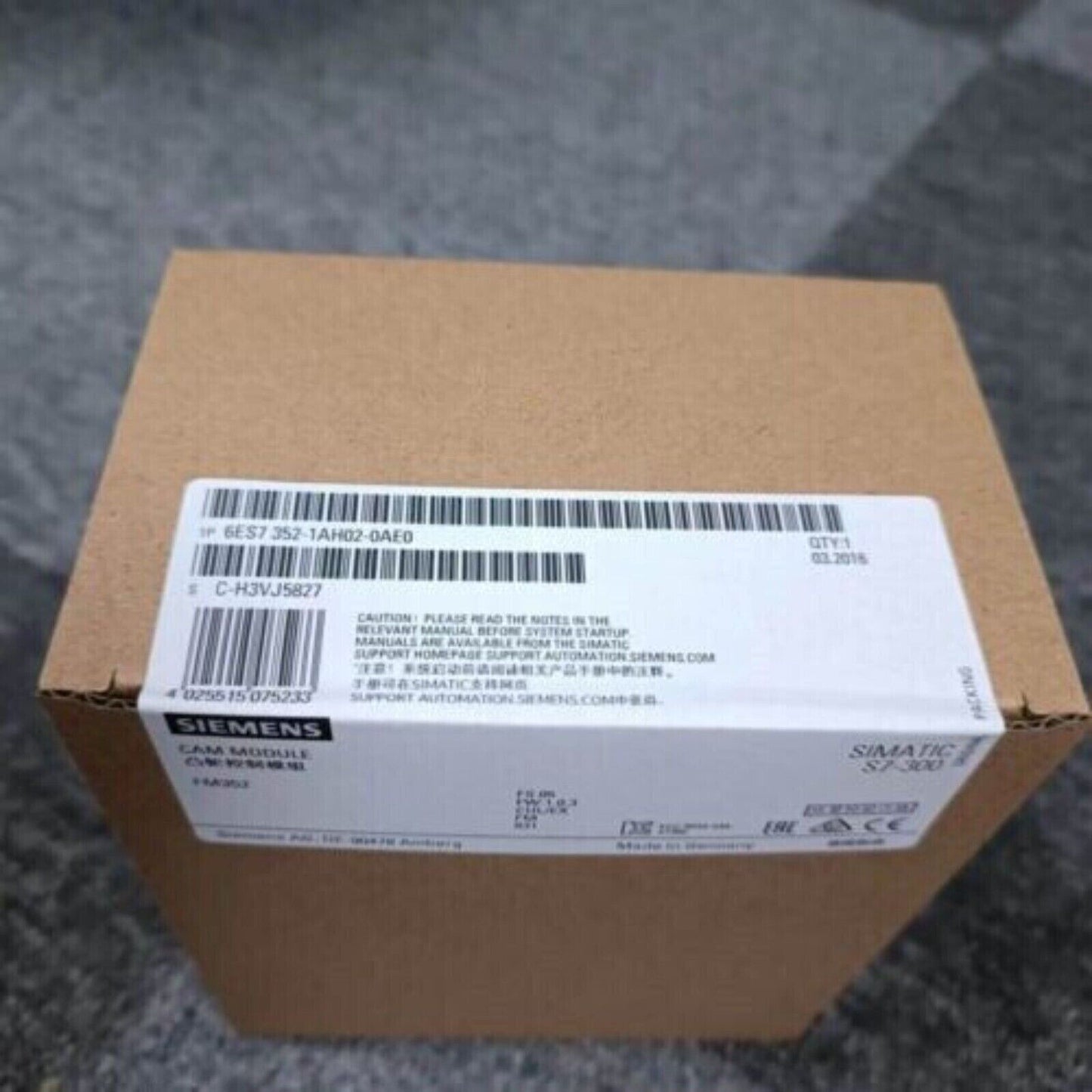 Siemens SIMATIC S7-300 FM 352 Cam Module in original packaging, product code 6ES7 352-1AH02-0AE0, industrial automation part.