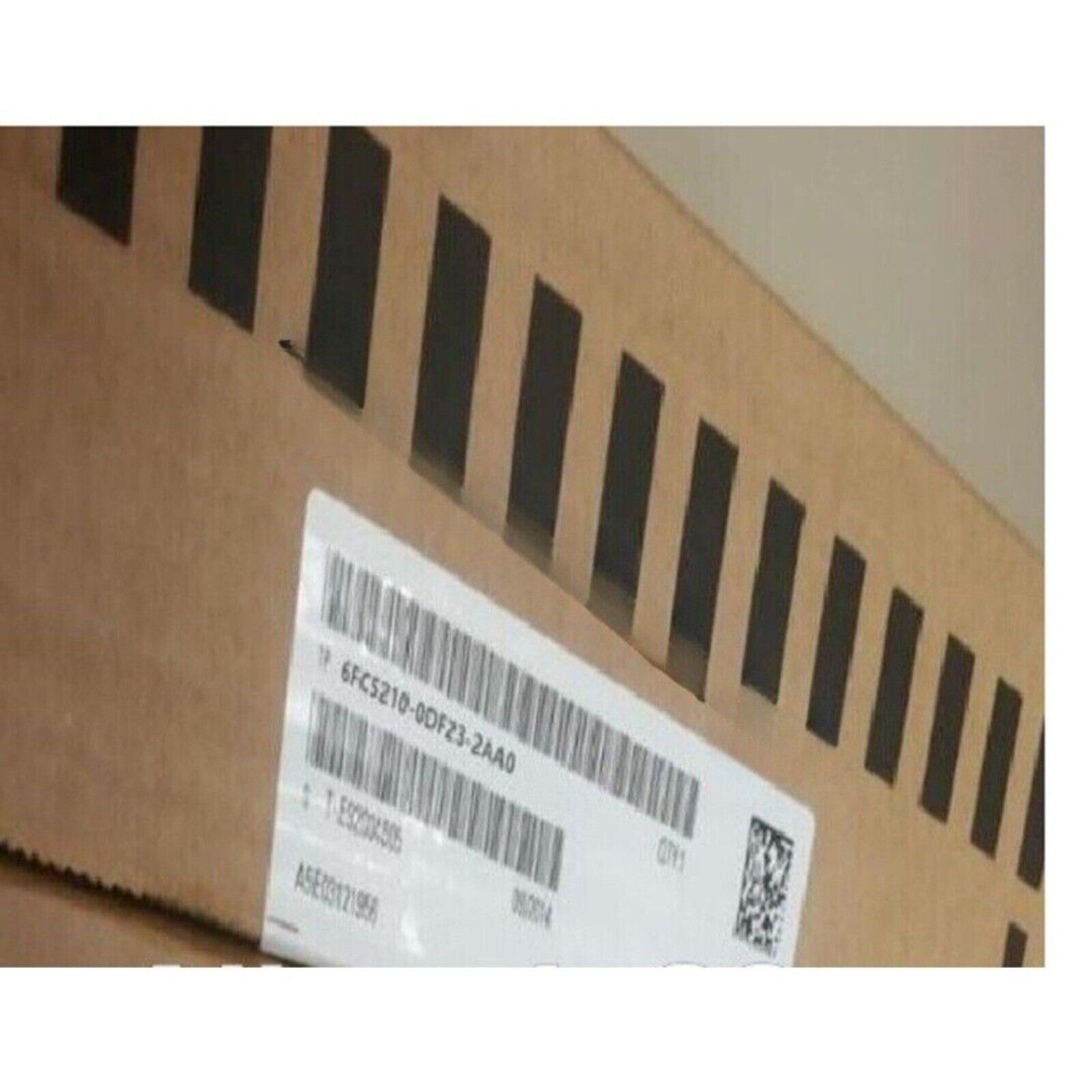 Siemens 6FC5210-0DF23-2AA0 SINUMERIK PCU 50 industrial automation part label on a cardboard box