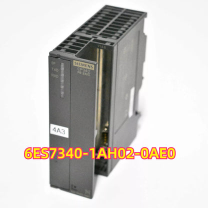 Siemens SIMATIC S7-300 CP 340 PLC module, gray with text 6ES7340-1AH02-0AE0