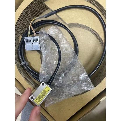 FANUC A860-2155-V001 Servo Motor Sensor, industrial automation part with black cables and connectors.