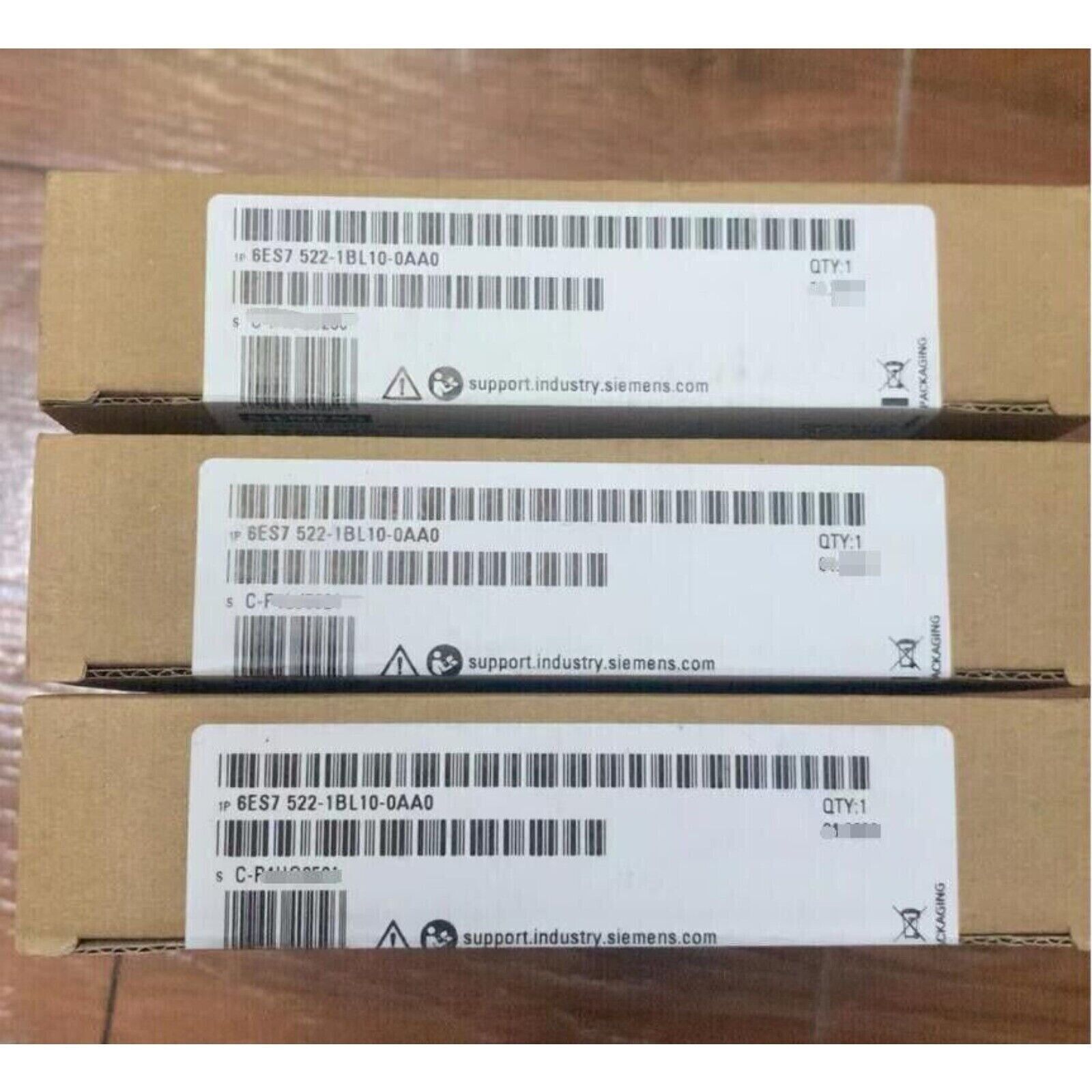 Siemens S7-1500 digital output modules in packaging. Model 6ES7 522-1BL10-0AA0.