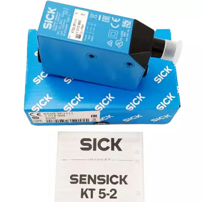 SICK KT5G-2P1111 photoelectric switch, industrial automation sensor, blue with black and white details.