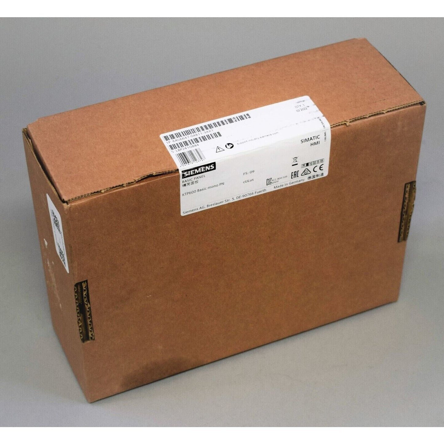 Siemens SIMATIC HMI KTP600 Basic mono PN in original packaging, product box.
