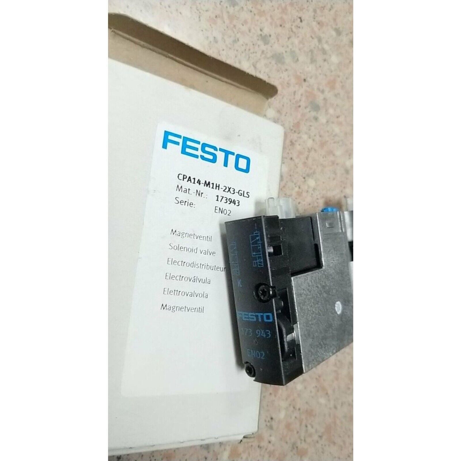 FESTO CPA14-M1H-2X3-GLS solenoid valve, industrial automation component. Product details and markings.