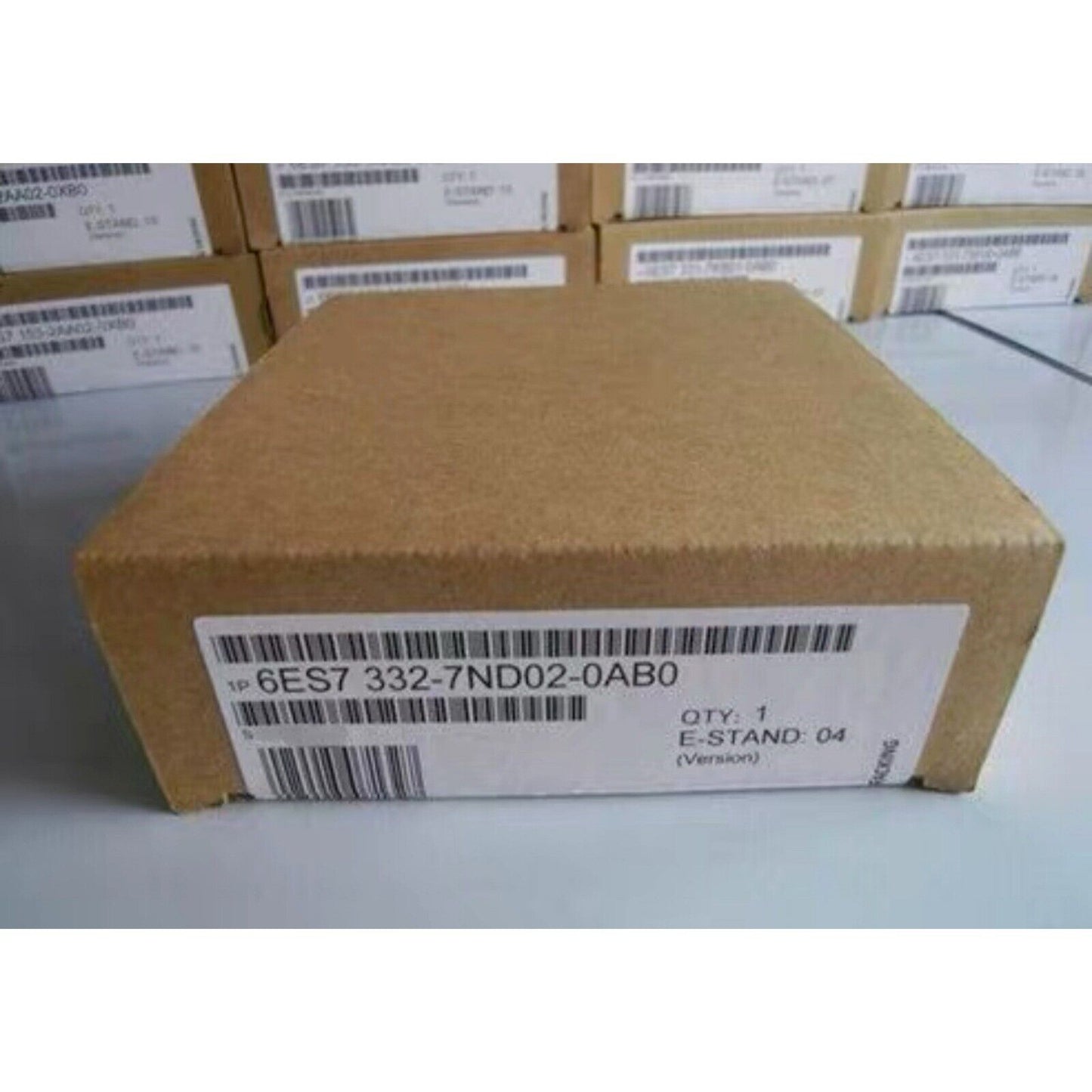 SIMATIC S7-300 module in brown packaging with label showing product code 6ES7 332-7ND02-0AB0