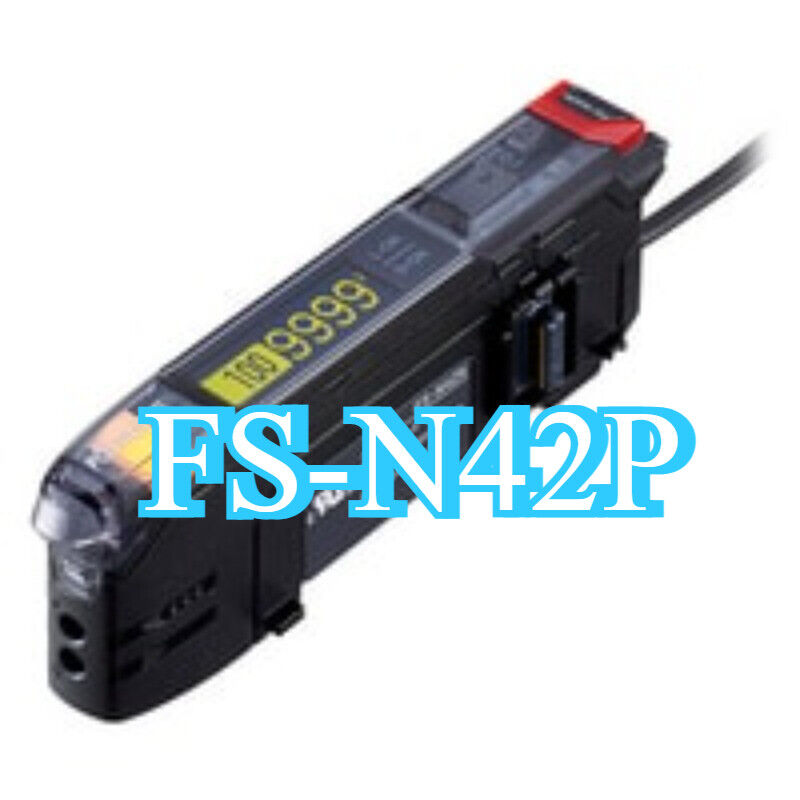 Keyence FS-N42P Fiber optic amplifier sensor. Black sensor with digital display showing a value.