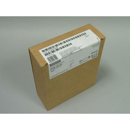 Siemens SIMATIC S7-300 digital input module in its box, part number 6ES7 323-1BL00-0AA0, for industrial automation.