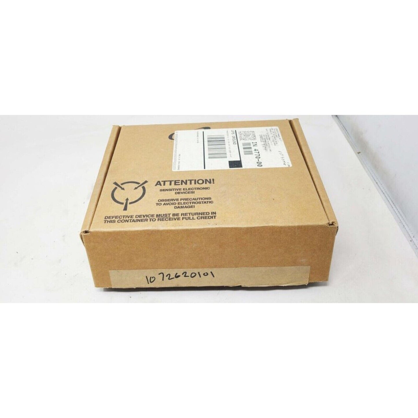 Cardboard box with shipping label and warning labels for Yaskawa inverter CPU board parts, packaging for the product