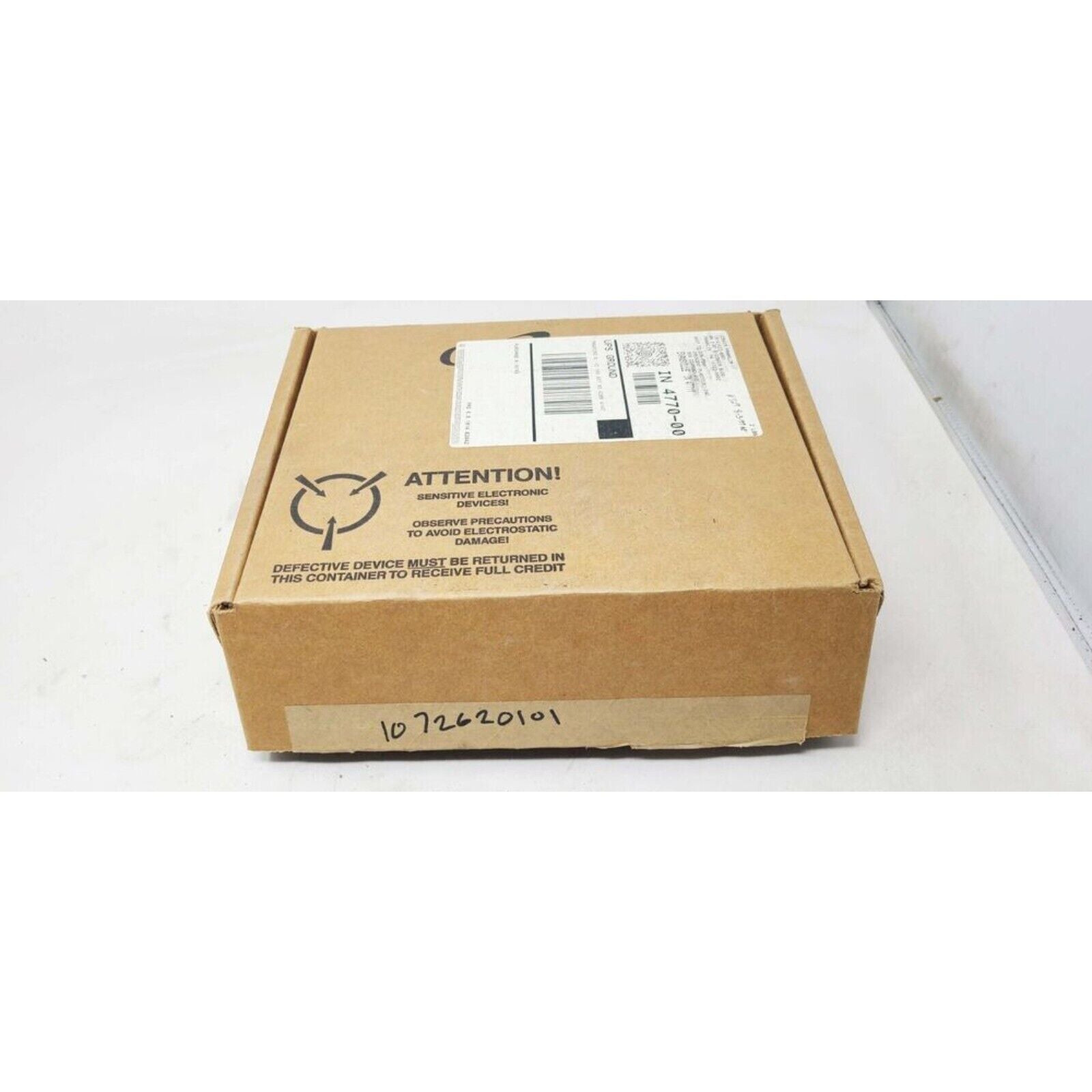 Cardboard box with shipping label and warning labels for Yaskawa inverter CPU board parts, packaging for the product
