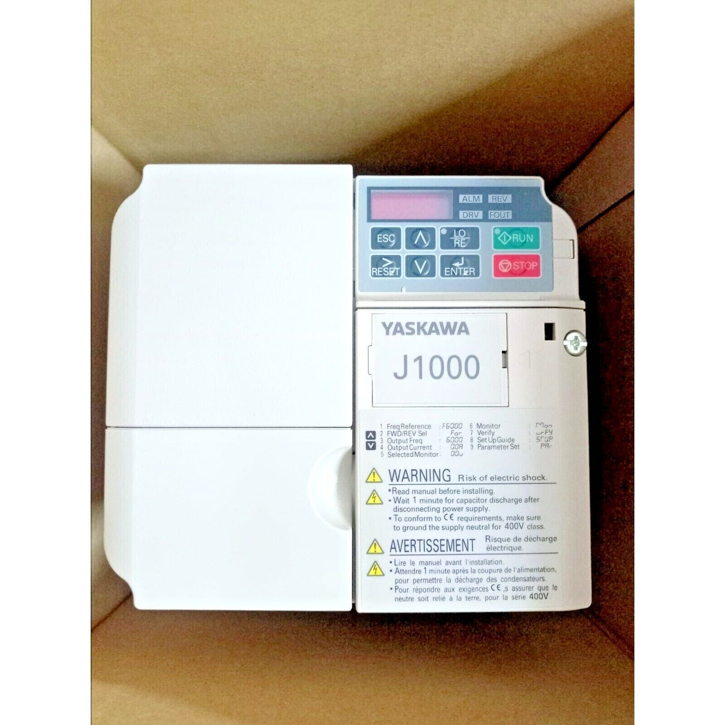YASKAWA J1000 variable frequency drive, white control panel with buttons and display, industrial automation equipment