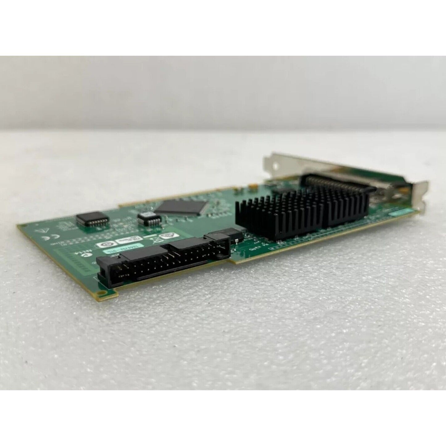 National Instruments PCI-6602 data acquisition card with heatsink and components, for industrial automation.