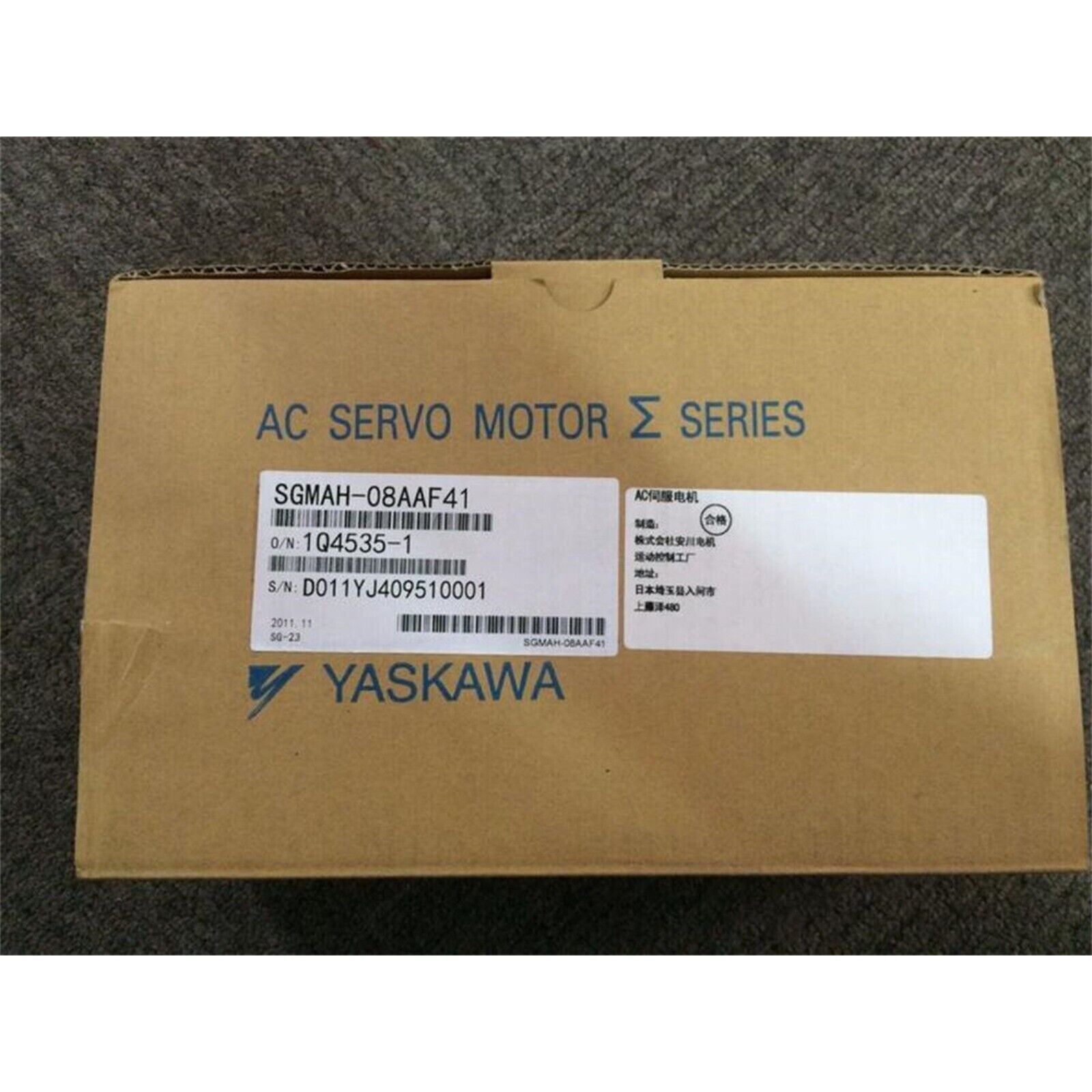 Yaskawa SGMAH-08AAF41 AC Servo Motor box. Model number, serial information and Yaskawa logo visible.