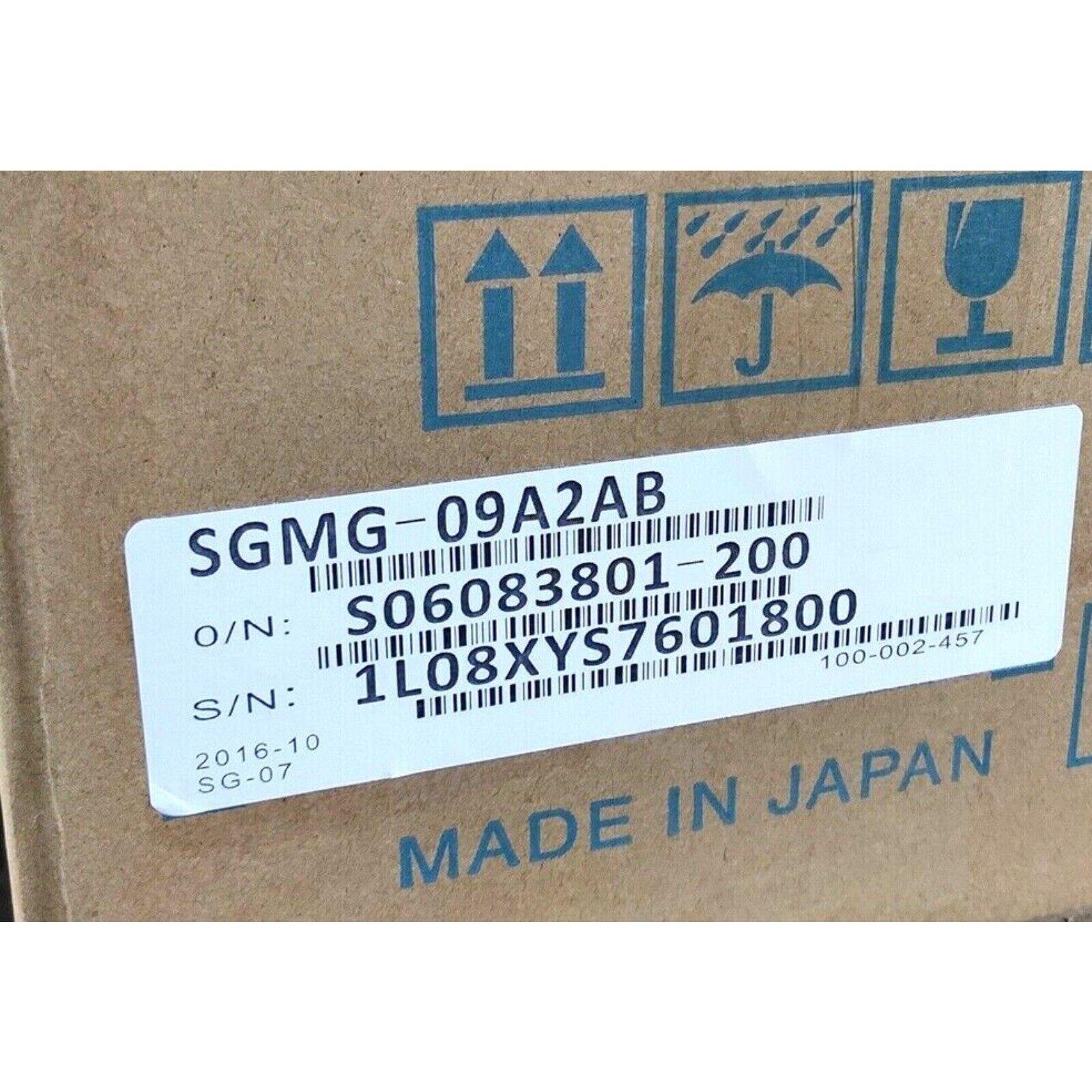 Yaskawa SGMG-09A2AB Servo Motor in box, product label with O/N and S/N information, Made in Japan.