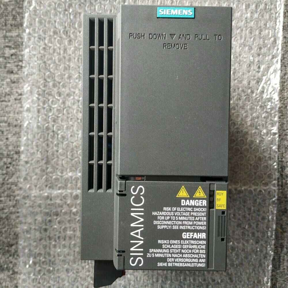 Siemens SINAMICS G120C PLC module, gray industrial automation part, power supply warning, model 6SL3210-1KE21-3UP1