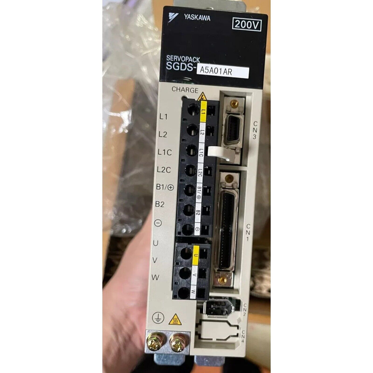 Yaskawa SGDS-A5A01AR SERVOPACK servo drive, industrial automation part, with multiple input and output ports, 200V.