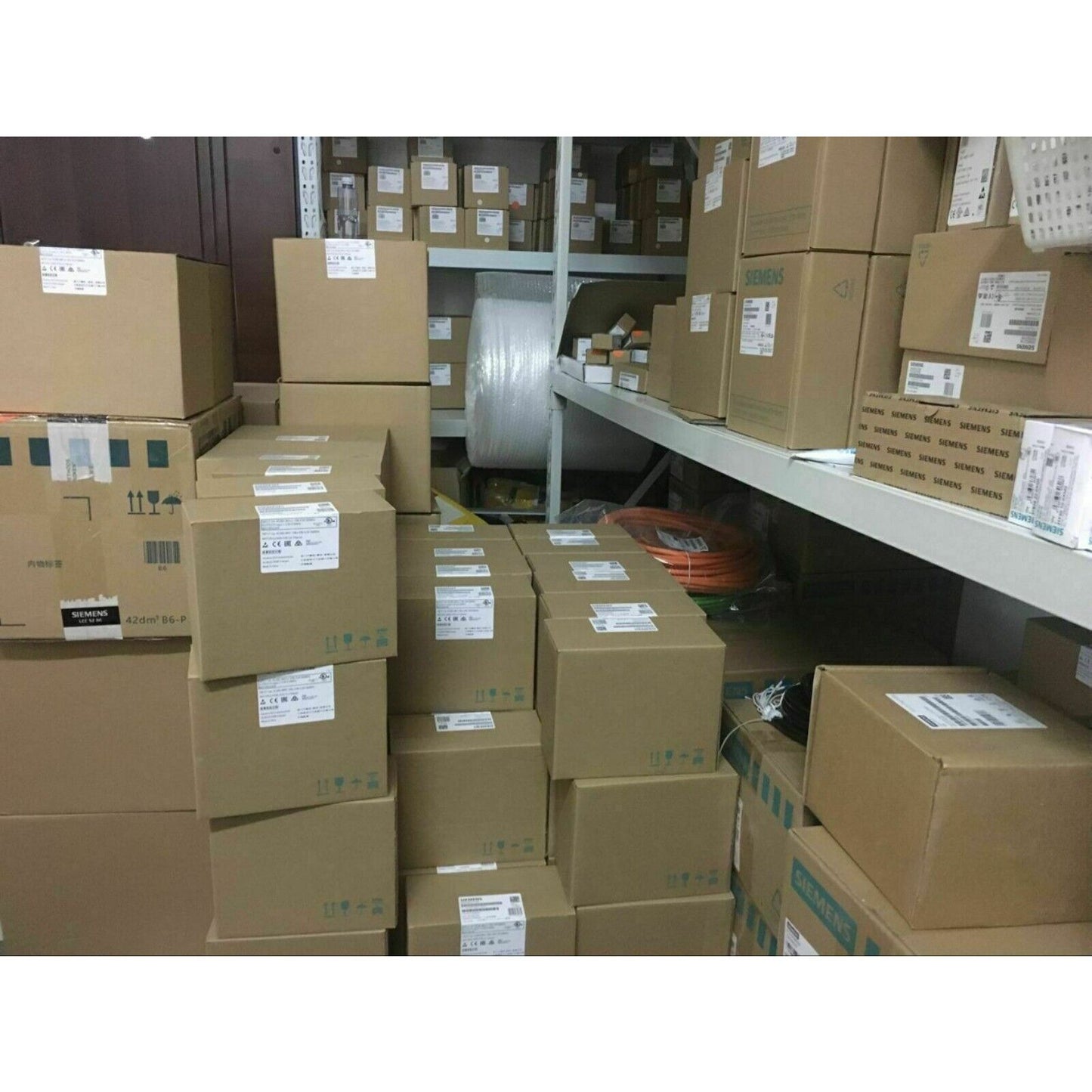 Siemens S7-300 industrial automation parts in warehouse, S7-300 modules stocked for sale.