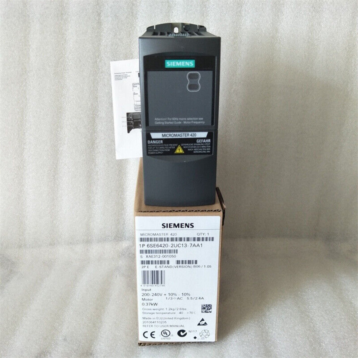 Siemens MICROMASTER 420 VFD (6SE6420-2UC13-7AA1) in packaging, industrial automation equipment.