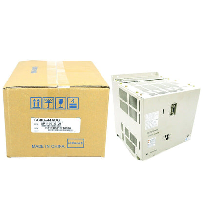 YASKAWA SGDB-44ADG servo drive new in box, product detail view, including the cardboard box and the servo drive module.