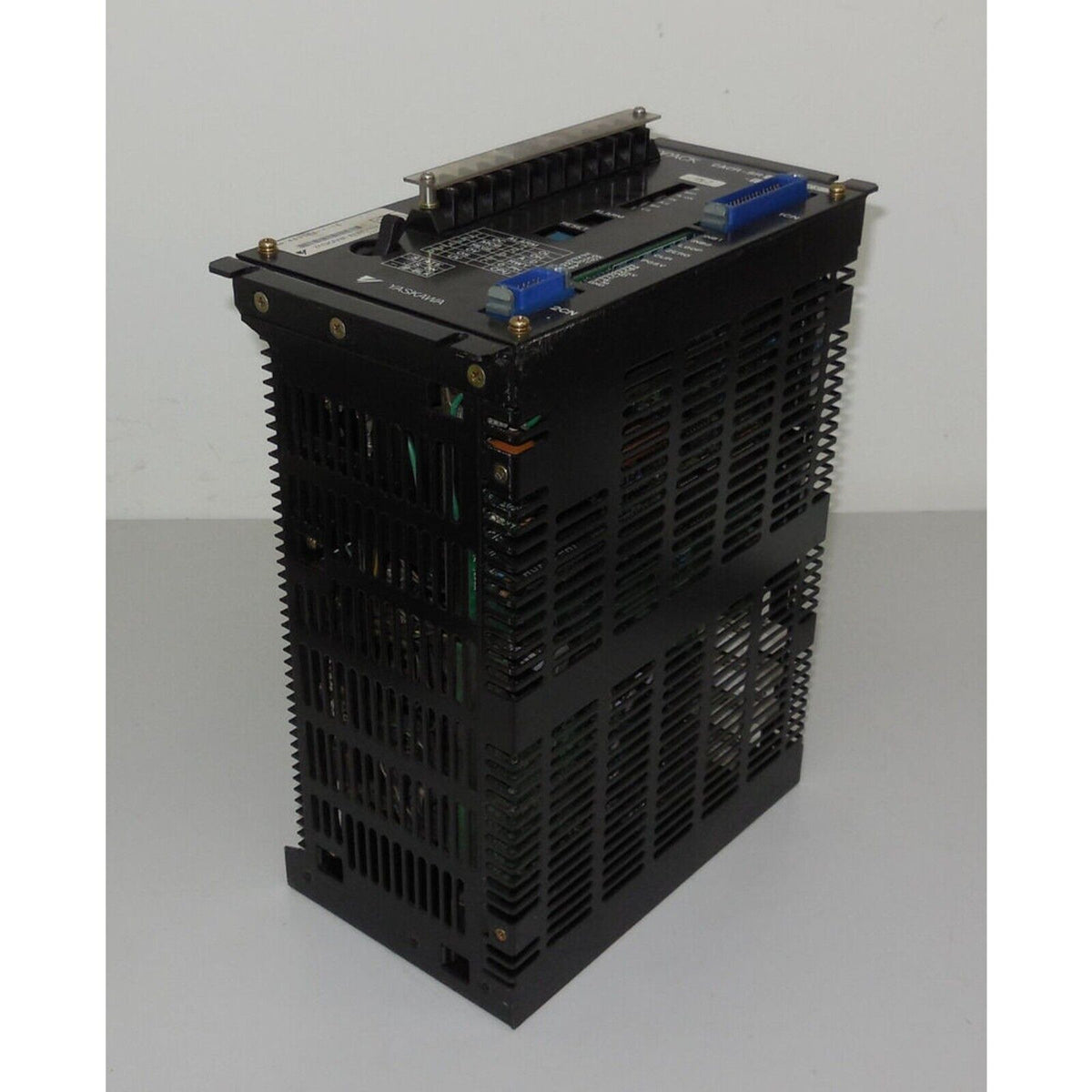 Yaskawa CACR-SR05BC1ES-Y278 Servopack servo drive, black metal enclosure with cooling fins and ports.