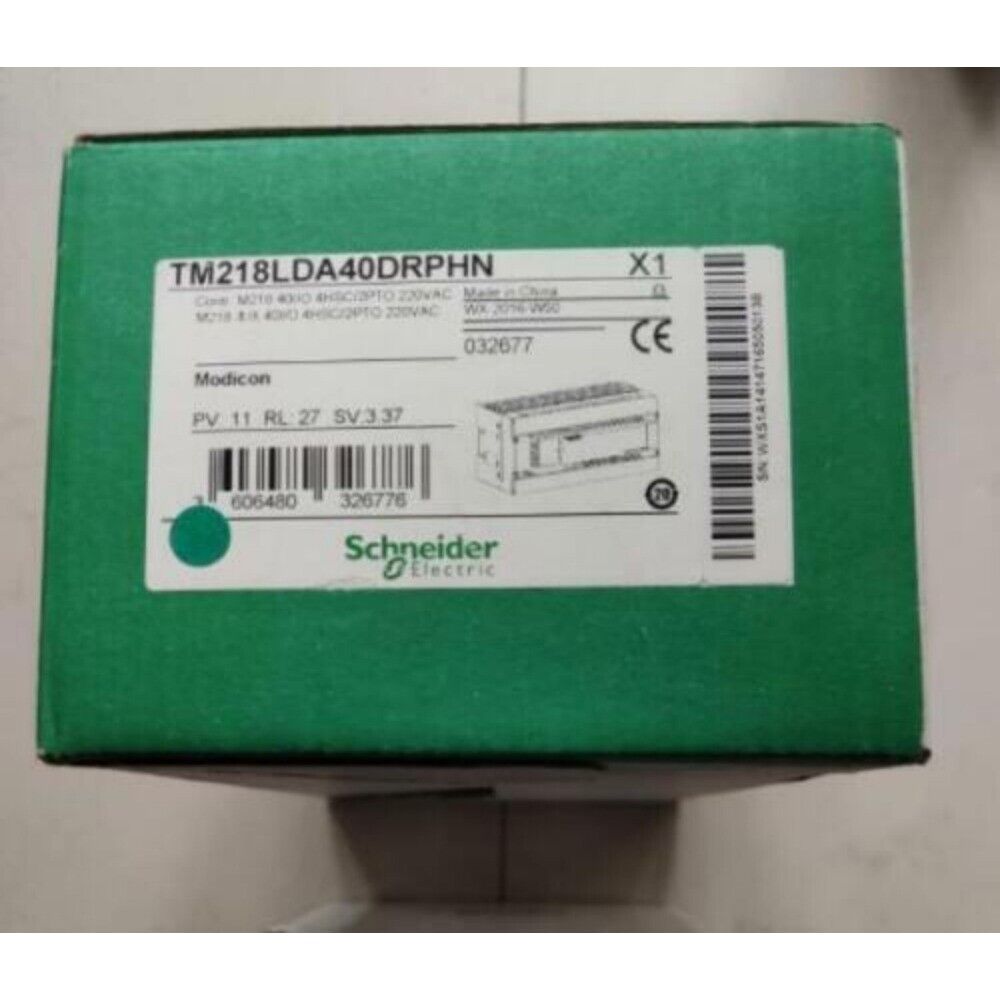 Schneider Electric TM218LDA40DRPHN PLC Module - New In Box, green box with product information.