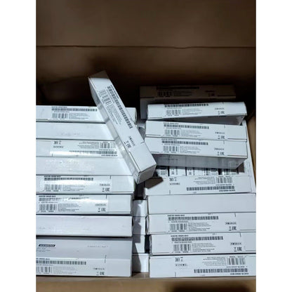 Siemens ANT795-4MA IWLAN Antenna boxes in a warehouse, industrial automation parts.