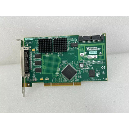 National Instruments PCI-6602 data acquisition card, green circuit board, black heatsink.