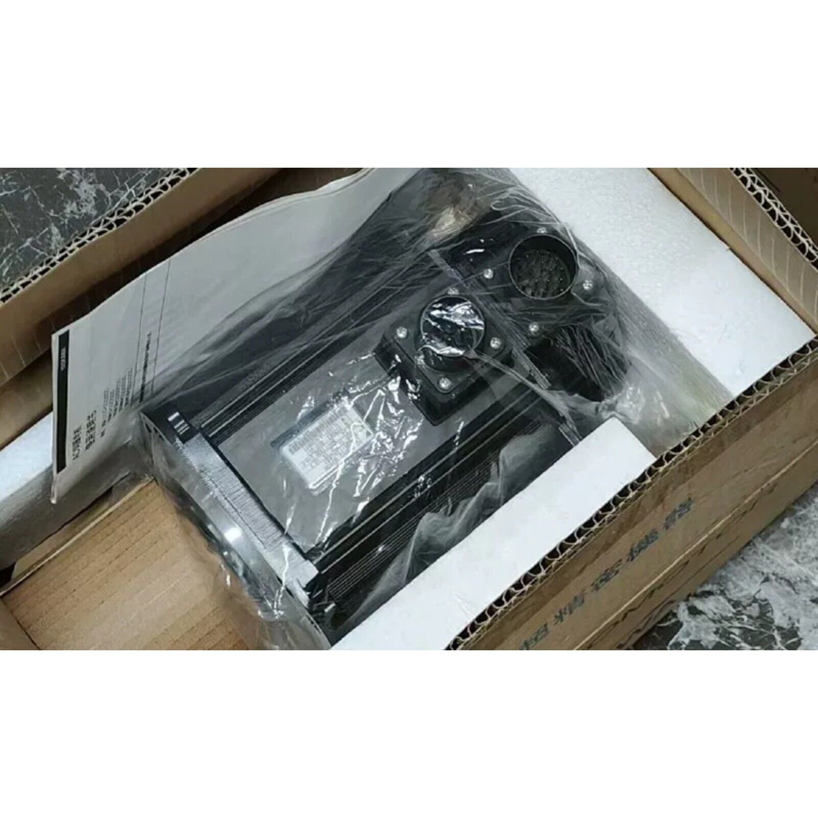 New Yaskawa SGMGH-13ACA61 servo motor in box. Black motor, industrial automation spare part.