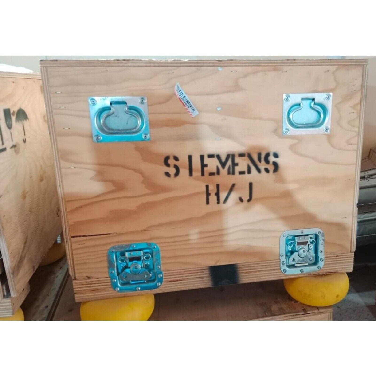 Siemens industrial automation equipment shipping crate, wooden box with metal hardware, H/J label.