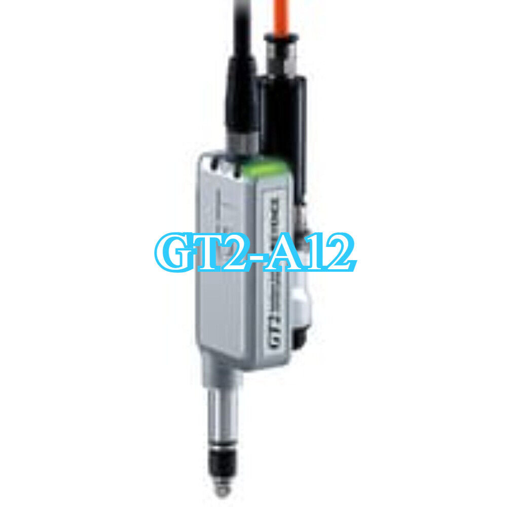 KEYENCE GT2-A12 Contact Sensor - Close-up view of the sensor with connected cables, industrial automation component.