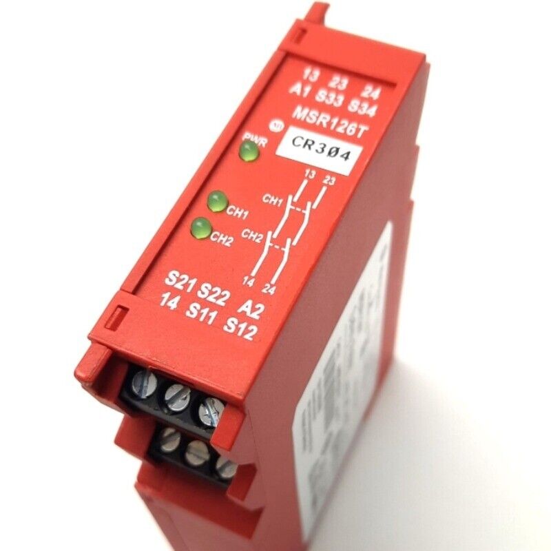 Allen-Bradley MSR126T Safety Relay. Red industrial safety relay with indicators and terminal block for PLC systems.