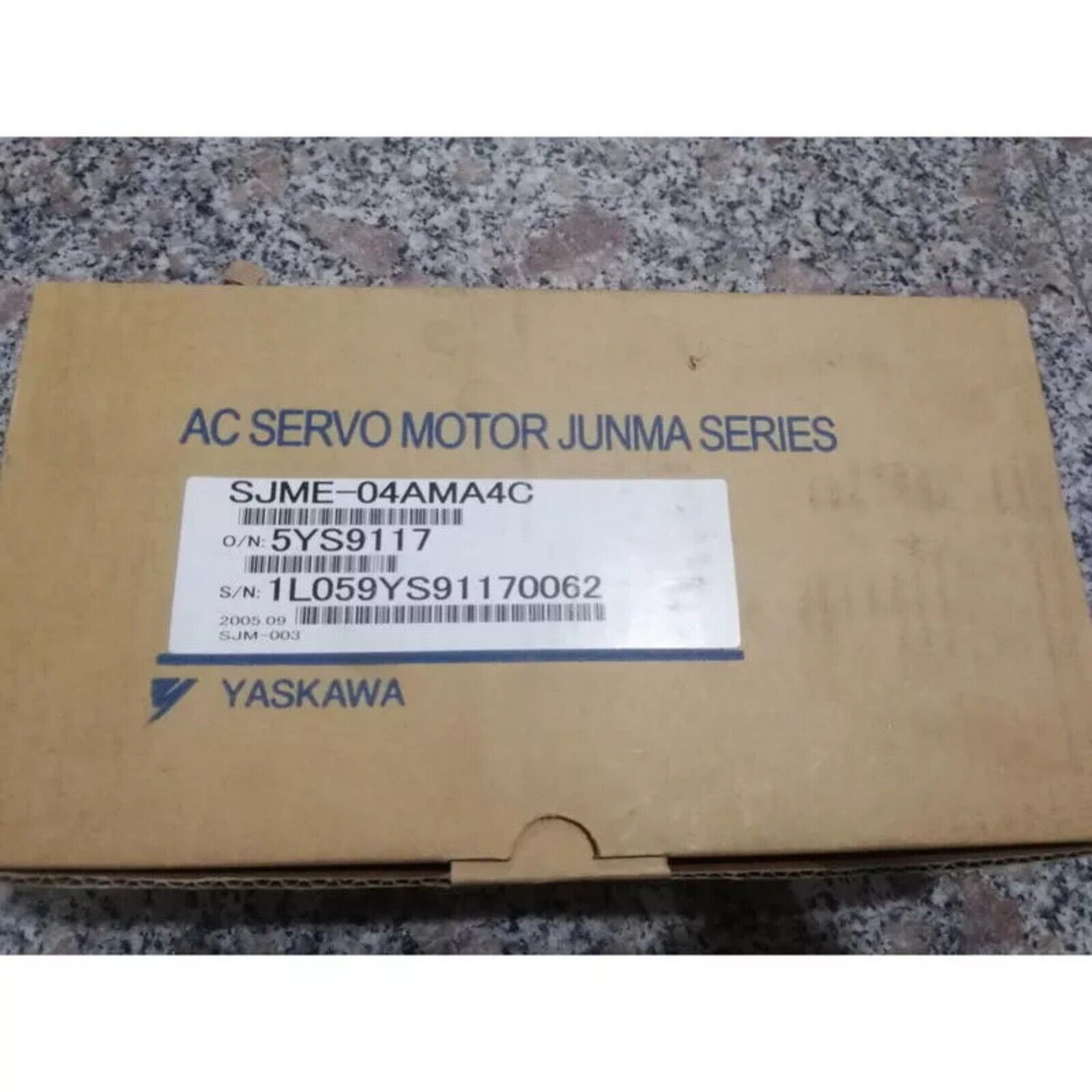 YASKAWA SJME-04AMA4C Servo Motor in box. New industrial automation part, model SJME-04AMA4C.