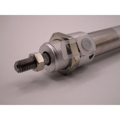Festo DSNU-20-80-PPV-A pneumatic cylinder detail, industrial automation part, metal components.