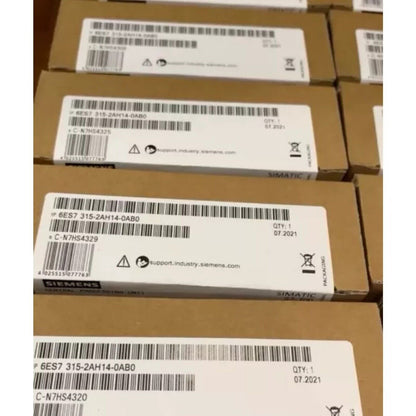Siemens SIMATIC S7-300 CPU 6ES7315-2AH14-0AB0 boxes, industrial automation parts, packaging.