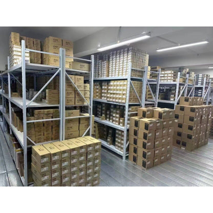 Industrial Automation Parts Warehouse: Shelves of Siemens and other brand boxes, equipment storage.