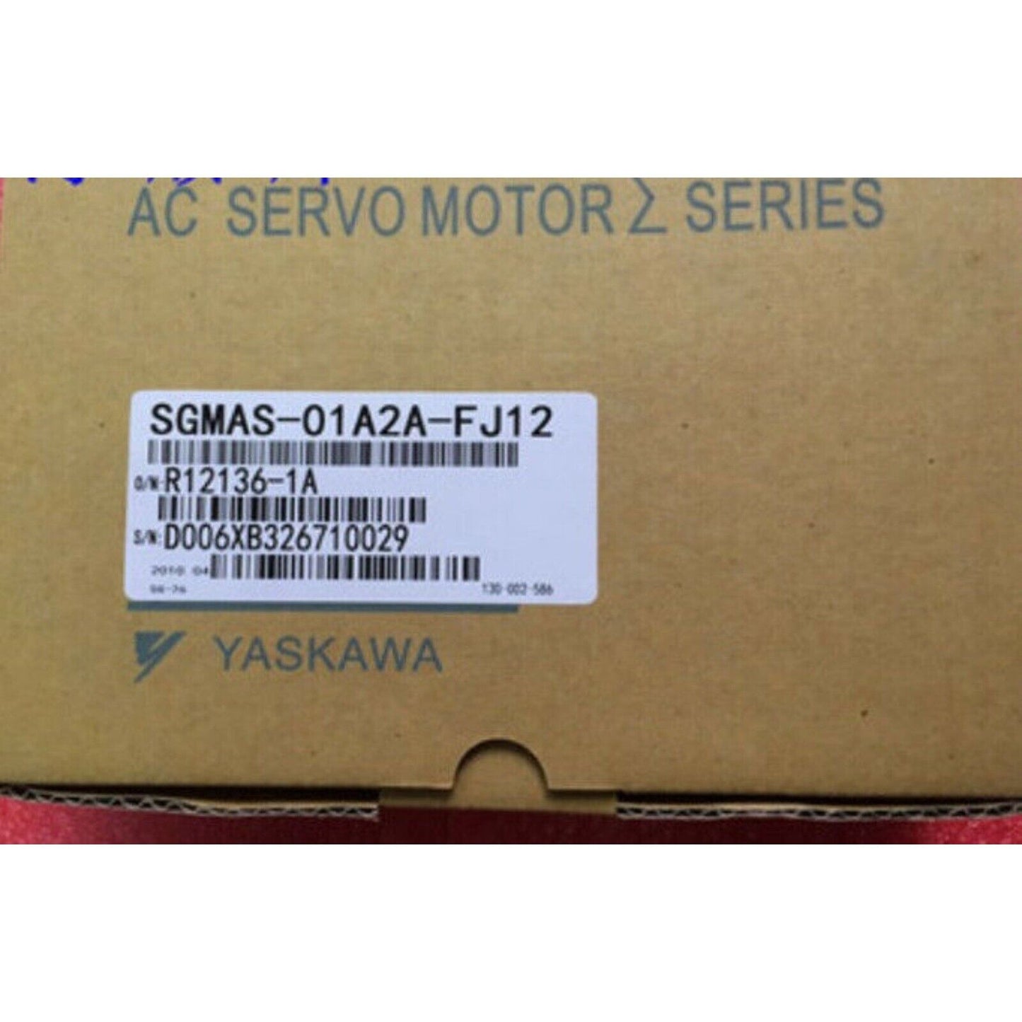 YASKAWA SGMAS-01A2A-FJ12 AC Servo Motor, SGMAS01A2AFJ12 model information label, industrial automation part.