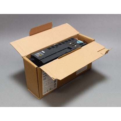 Siemens SINAMICS G120C frequency inverter in a cardboard box, industrial automation equipment.