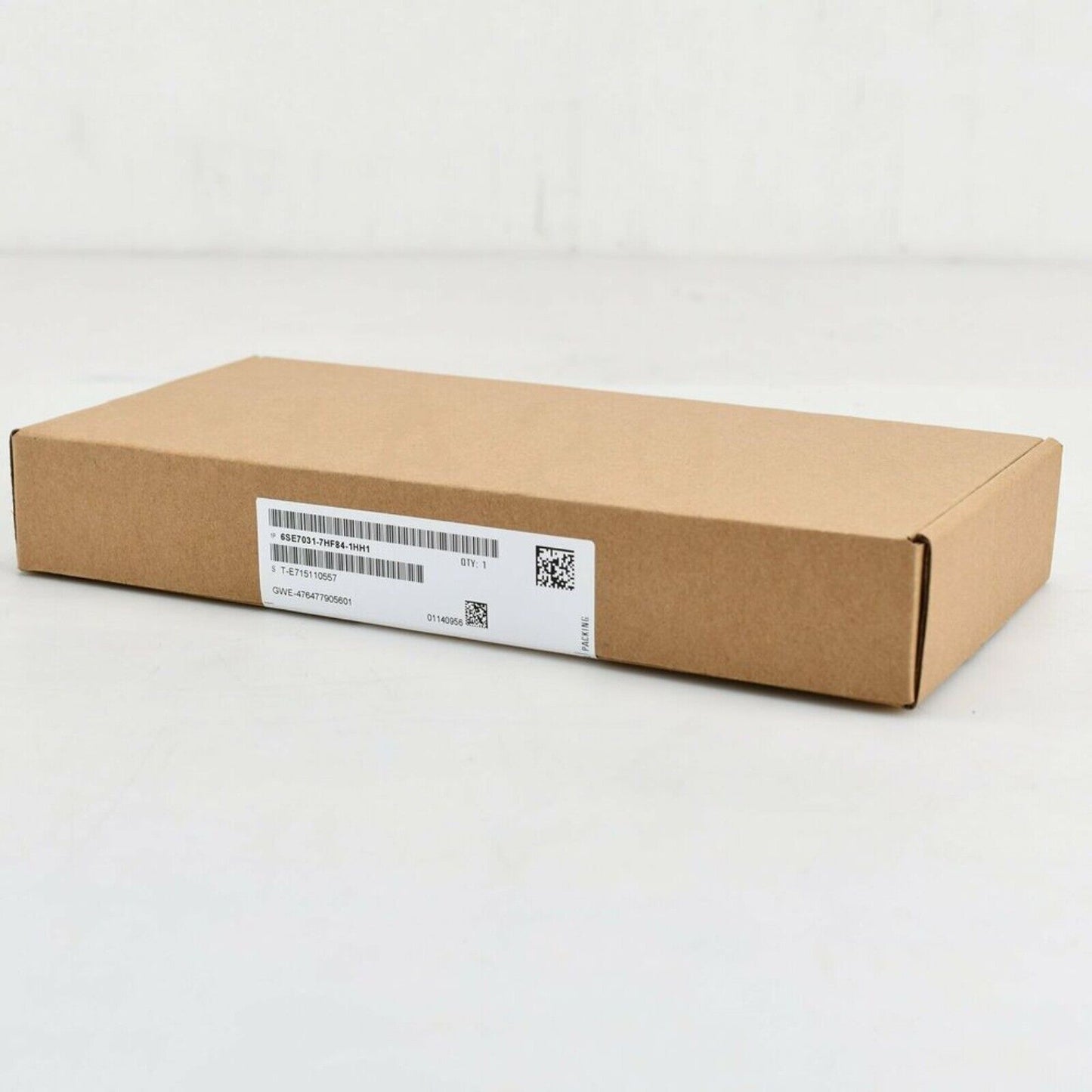 Siemens 6SE7031-7HF84-1HH1 Precharging Module in a brown cardboard box, industrial automation part.