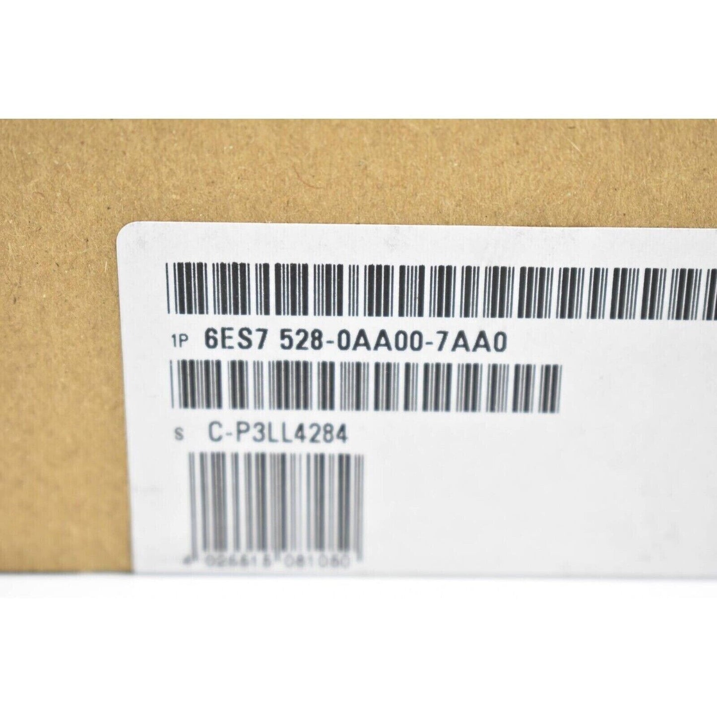 Siemens 6ES7 528-0AA00-7AA0 label on packaging, barcode, PLC spare part.