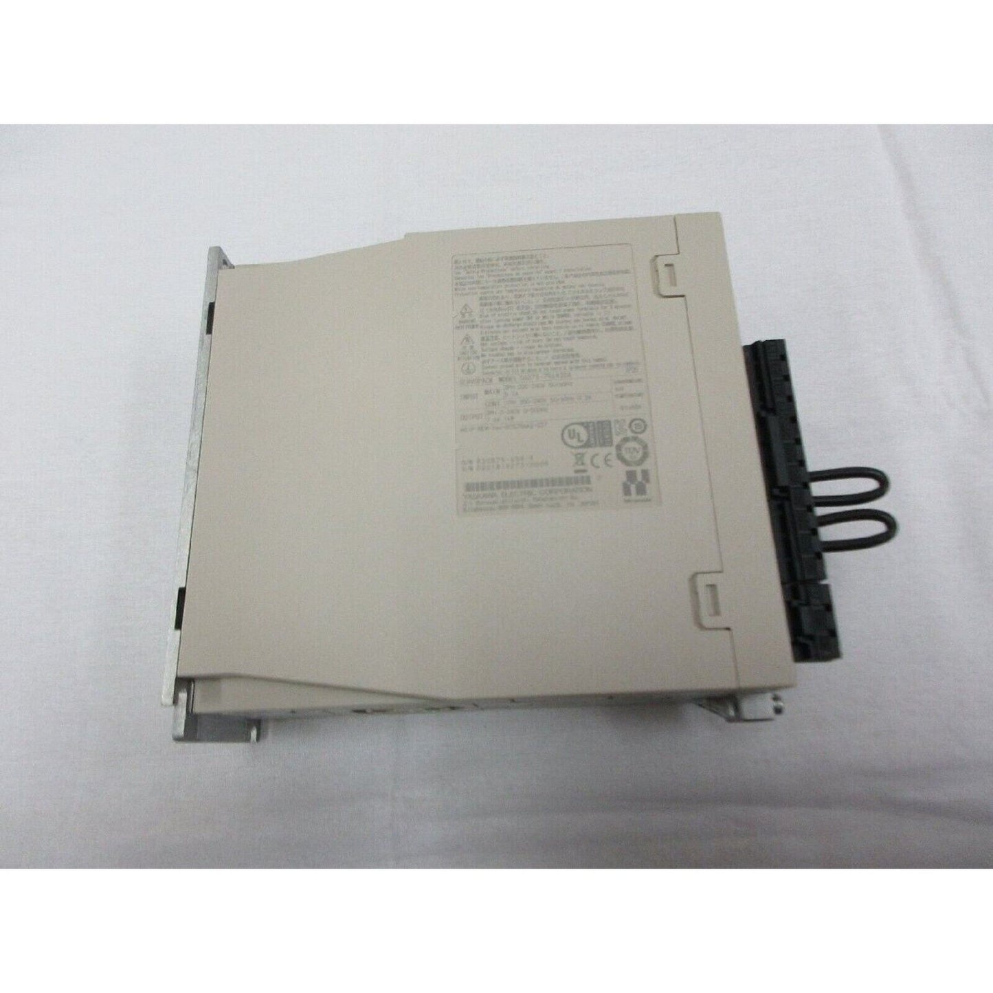 Yaskawa SGD7S-7R6A20A Servopack servo drive, unused spare part for industrial automation. Beige housing.