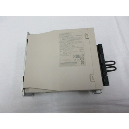 Yaskawa SGD7S-7R6A20A Servopack servo drive, unused spare part for industrial automation. Beige housing.