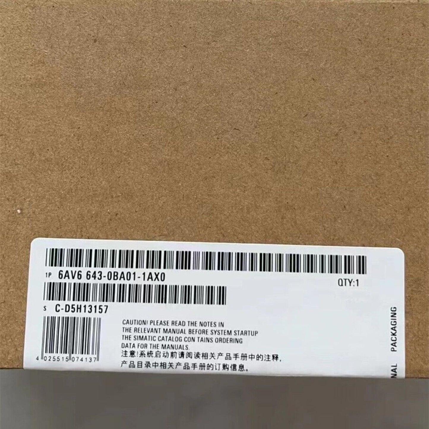 Siemens KTP700 Comfort Panel box label with model number, barcode, and caution notes. Features PROFINET HMI part information.