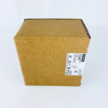 Siemens SIMATIC ET 200SP CPU 1512SP F-1 PN in original packaging. PLC module product label visible.