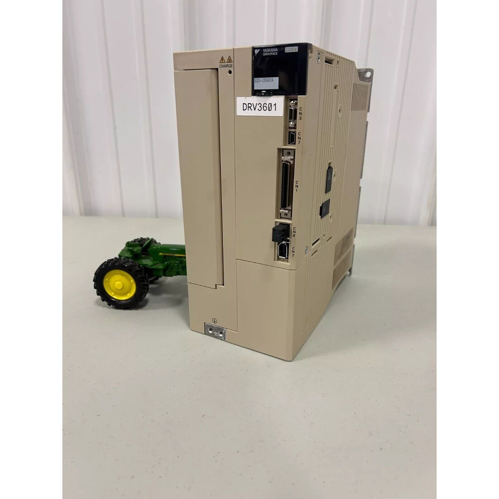 Yaskawa SGDV-330A01A AC Servo Drive, beige industrial equipment with label DRV3601, SERVOPACK