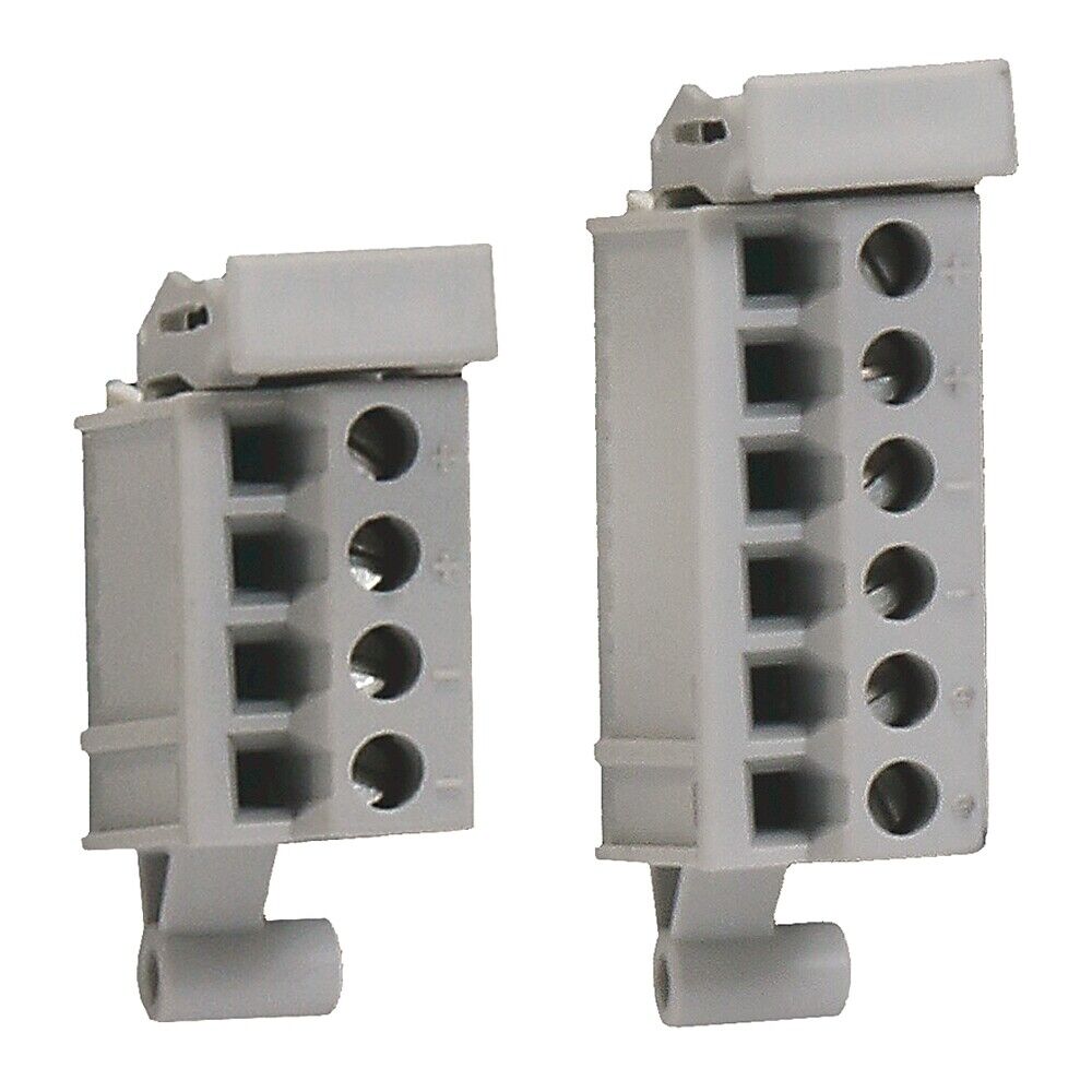 Gray screw terminal blocks for PLC wiring, industrial automation parts.