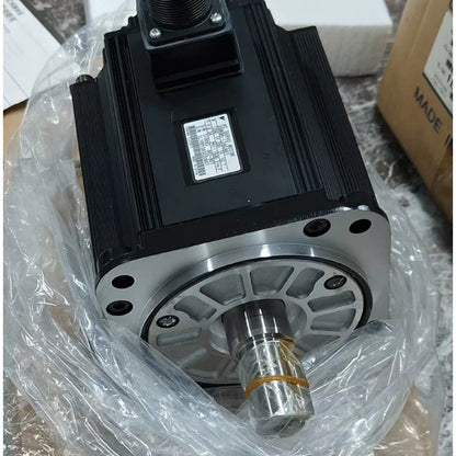 Yaskawa SGMGH-13ACA61 servo motor in package. Black industrial automation part, made in China. With model and serial info.