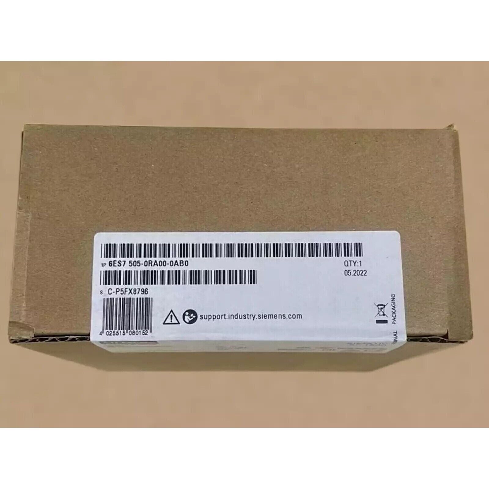 Siemens S7-1500 system power supply in cardboard packaging, model 6ES7 505-0RA00-0AB0.