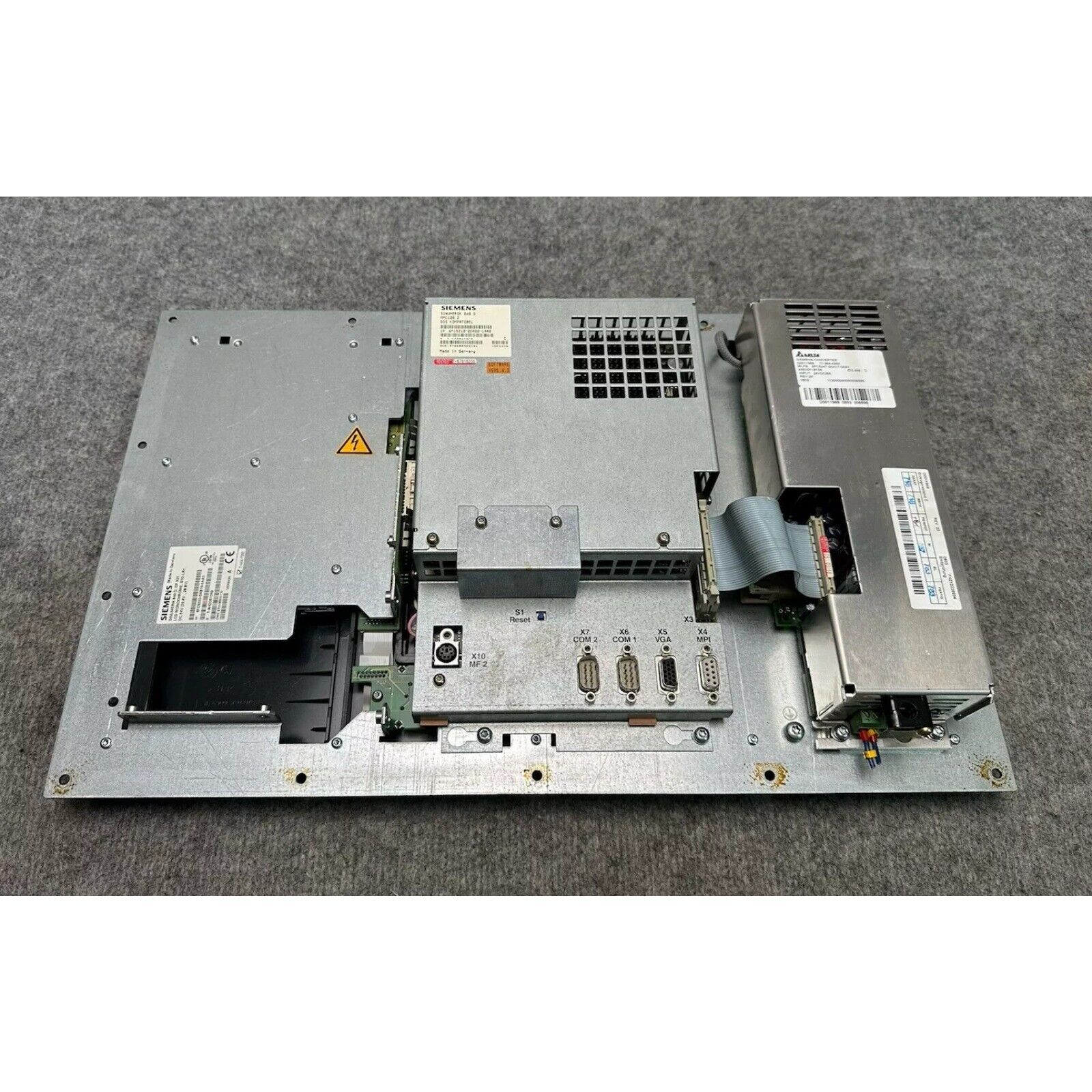 Siemens 6FC5210-0DA00-1AA0 CNC control module, industrial automation part, connectors and labels visible.