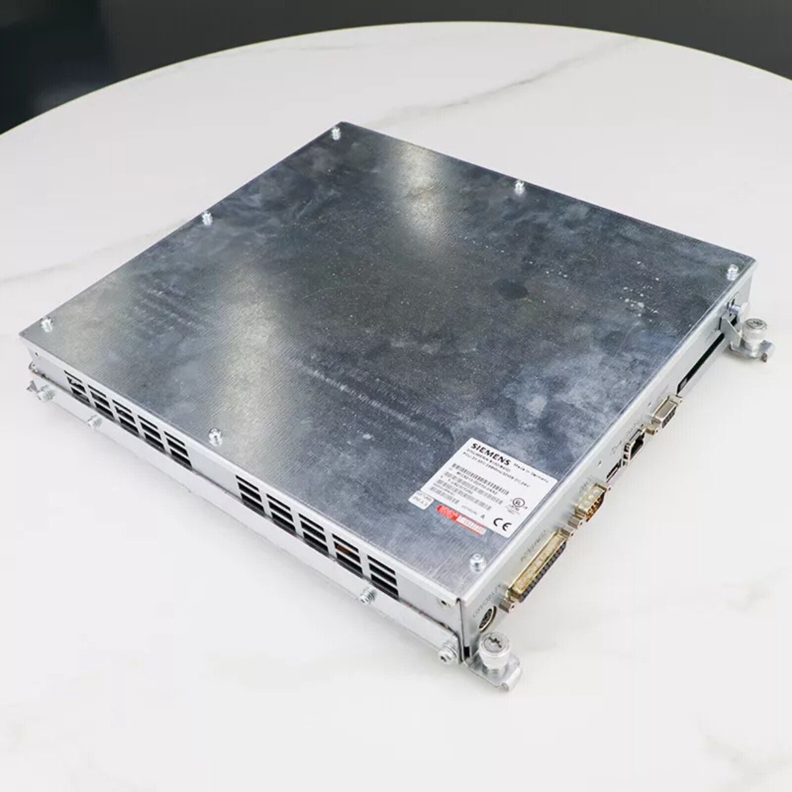 Siemens 6FC5210-0DF00-0AA2 PLC Control Unit, metal casing with ports, industrial automation part.