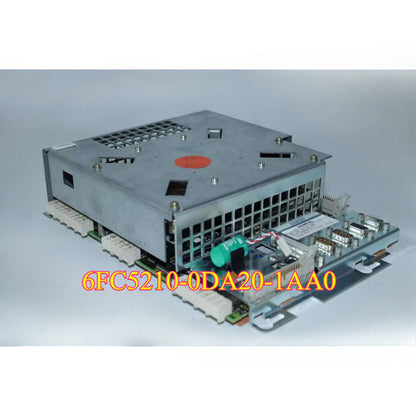 Siemens PLC module 6FC5210-0DA20-1AA0, a gray and silver electronic component with the model number clearly visible.